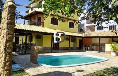 Imagem: A casa possui 5 Dormitórios, 5 Banheiros, 5 Vagas na garagem