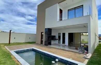 Imagem: A casa possui 4 Dormitórios, 3 Banheiros, 2 Vagas na garagem