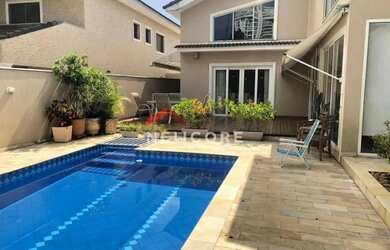 Imagem: A casa em condomínio possui 4 Dormitórios, 5 Banheiros, 4