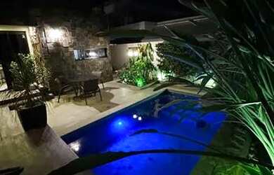 Imagem: A casa em condomínio possui 4 Dormitórios, 5 Banheiros, 4