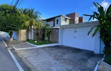 Imagem: A casa possui 4 Dormitórios, 4 Banheiros, 5 Vagas na garagem