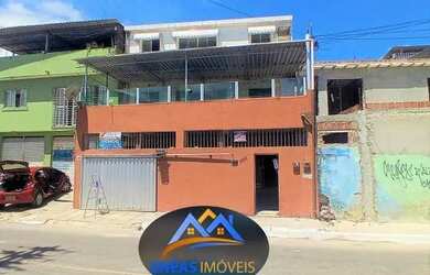 Imagem: A casa possui 4 Dormitórios, 2 Banheiros, 3 Vagas na garagem