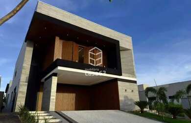 Imagem: A casa em condomínio possui 4 Dormitórios, 5 Banheiros, 2