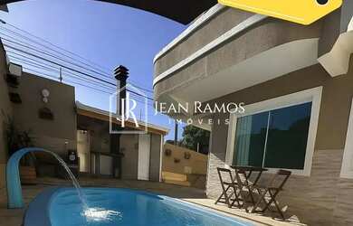 Imagem: A casa possui 3 Dormitórios, 5 Banheiros, 3 Vagas na garagem