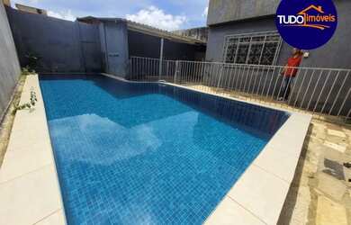 Imagem: A casa possui 4 Dormitórios, 2 Banheiros, 4 Vagas na garagem