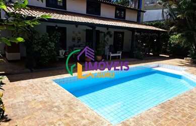 Imagem: A casa possui 3 Dormitórios, 4 Banheiros, 4 Vagas na garagem