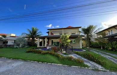 Imagem: A casa possui 5 Dormitórios, 5 Banheiros, 3 Vagas na garagem