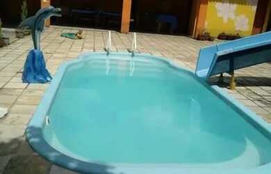 Imagem: A casa possui 3 Dormitórios, 3 Banheiros, 5 Vagas na garagem