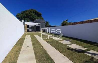 Imagem: A casa possui 3 Dormitórios, 2 Banheiros, 4 Vagas na garagem