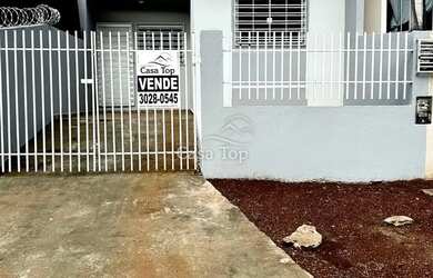 Imagem: A casa possui 2 Dormitórios, 1 Banheiro, 1 Vaga na garagem