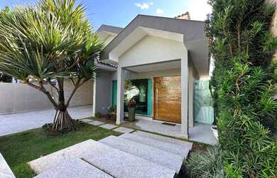 Imagem: A casa possui 4 Dormitórios, 5 Banheiros, 4 Vagas na garagem