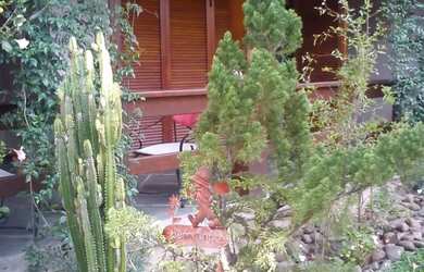 Imagem 2: Casa a venda no Guarujá. Piscina, Churrasqueira, VarandaeLareira