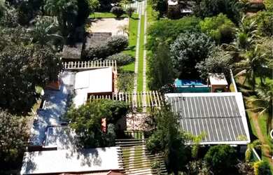 Imagem: A casa possui 5 Dormitórios, 5 Banheiros, 5 Vagas na garagem