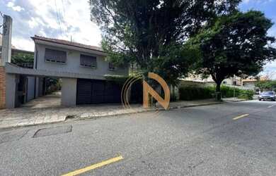 Imagem: A casa possui 4 Dormitórios, 5 Banheiros, 5 Vagas na garagem