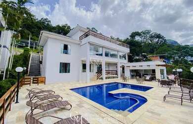 Imagem: A casa em condomínio possui 4 Dormitórios, 5 Banheiros, 3