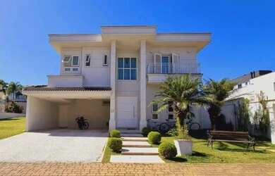 Imagem: A casa em condomínio possui 4 Dormitórios, 5 Banheiros, 4