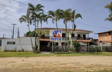 Imagem: A casa possui 3 Dormitórios, 3 Banheiros, 3 Vagas na garagem