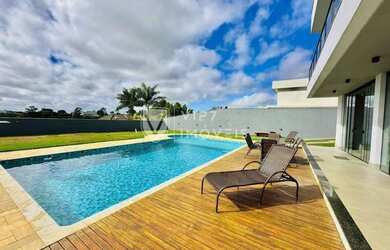 Imagem: A casa em condomínio possui 4 Dormitórios, 5 Banheiros, 5