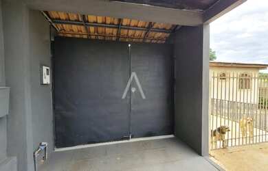 Imagem: A casa possui 3 Dormitórios, 2 Banheiros, 3 Vagas na garagem