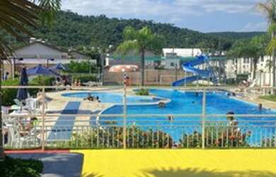 Imagem: A casa possui 2 Dormitórios, 2 Banheiros, 1 Vaga na garagem