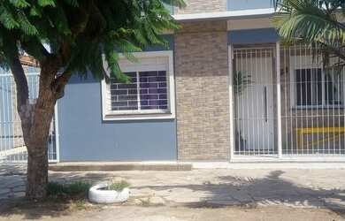 Imagem: A casa possui 2 Dormitórios, 2 Vagas na garagem e está localizado