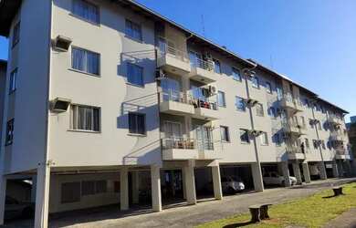 Imagem: O apartamento possui 3 Dormitórios, 1 Banheiro, 1 Vaga na garagem