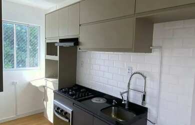 Imagem: O apartamento possui 2 Dormitórios, 1 Banheiro, 1 Vaga na garagem