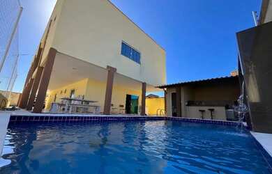 Imagem: A casa possui 4 Dormitórios, 5 Banheiros, 5 Vagas na garagem