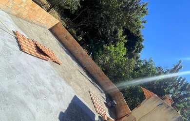 Imagem: A casa possui 2 Dormitórios, 3 Banheiros, 4 Vagas na garagem