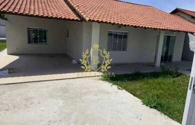 Imagem: A casa e possui 3 Dormitórios, Suítes, 2 Banheiros, 2 Vagas