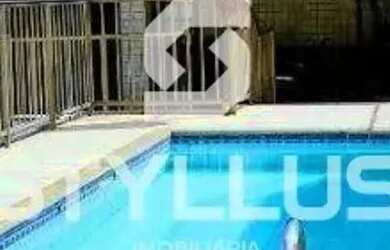 Imagem: A casa possui 3 Dormitórios, 3 Banheiros, 4 Vagas na garagem