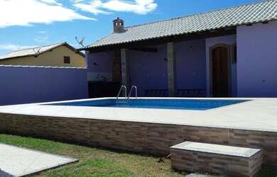 Imagem: A casa possui 3 Dormitórios, 3 Vagas na garagem e está localizado