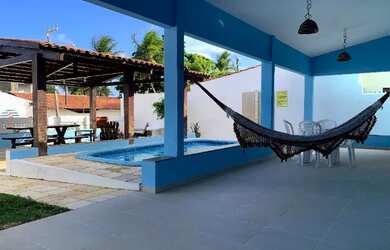 Imagem: A casa possui 5 Dormitórios, 5 Banheiros, 2 Vagas na garagem