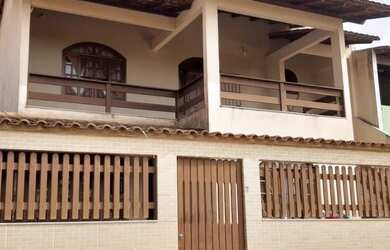 Imagem: A casa possui 4 Dormitórios, 2 Vagas na garagem e está localizado