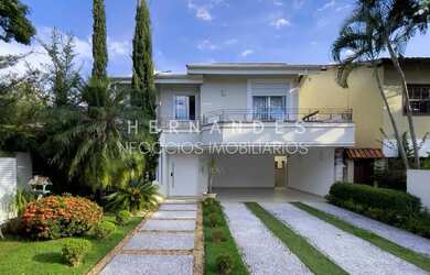 Imagem: A casa em condomínio possui 4 Dormitórios, 5 Banheiros, 4