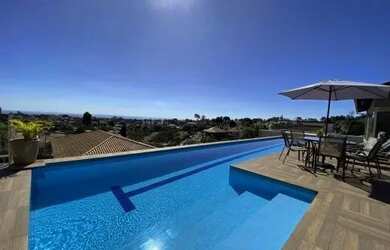 Imagem: A casa possui 5 Dormitórios, 5 Banheiros, 5 Vagas na garagem