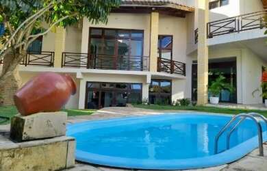 Imagem: A casa em condomínio possui 5 Dormitórios, 5 Banheiros, 5