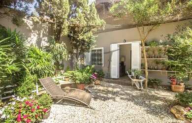 Imagem: A casa possui 3 Dormitórios, 5 Banheiros, 3 Vagas na garagem