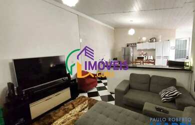 Imagem: A casa possui 3 Dormitórios, 2 Banheiros, 2 Vagas na garagem