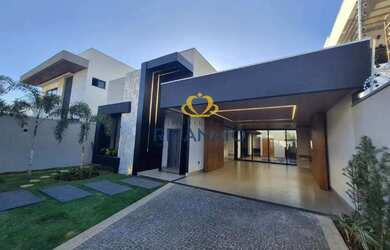 Imagem: A casa possui 4 Dormitórios, 1 Banheiro, 2 Vagas na garagem