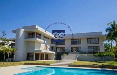 Imagem: A casa em condomínio possui 5 Dormitórios, 5 Banheiros, 5