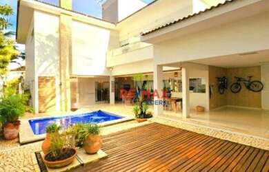 Imagem: A casa em condomínio possui 4 Dormitórios, 5 Banheiros, 4