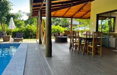 Imagem: A casa em condomínio possui 5 Dormitórios, 5 Banheiros, 4