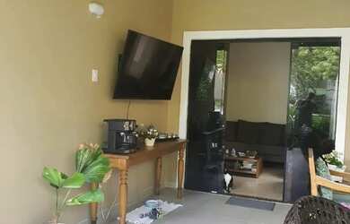 Imagem: A casa possui 4 Dormitórios, 4 Banheiros, 2 Vagas na garagem