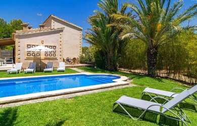 Imagem: A casa possui 5 Dormitórios, 5 Banheiros, 5 Vagas na garagem