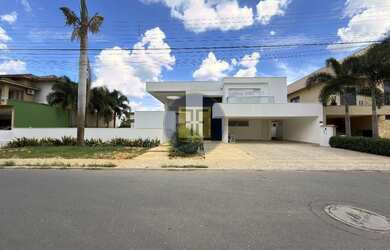 Imagem: A casa possui 4 Dormitórios, 5 Banheiros, 5 Vagas na garagem