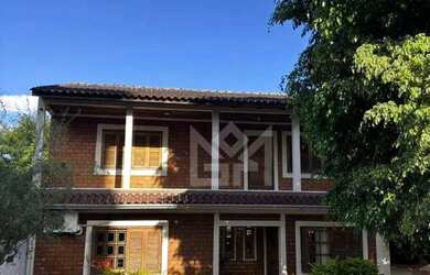 Imagem: A casa possui 4 Dormitórios, 3 Banheiros, 257m² de Área e