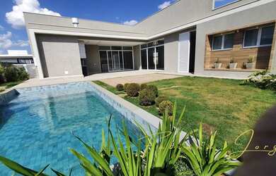 Imagem: A casa em condomínio possui 4 Dormitórios, 5 Banheiros, 5