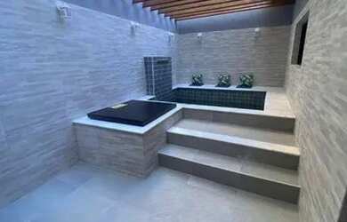 Imagem: A casa possui 2 Dormitórios, 3 Banheiros, 2 Vagas na garagem