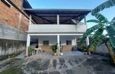 Imagem: A casa possui 3 Dormitórios, 3 Banheiros, 5 Vagas na garagem